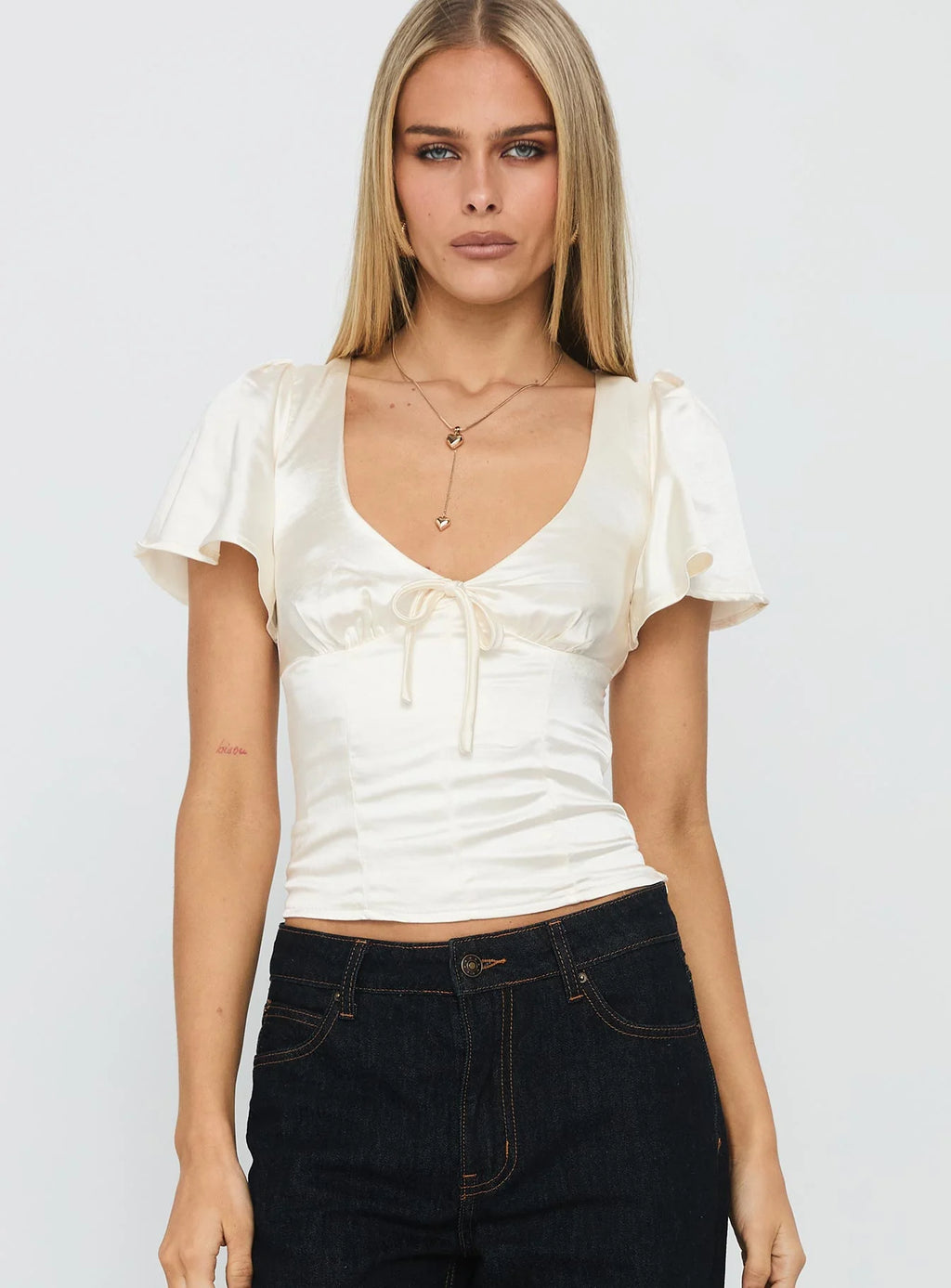 Lumière Cream V-Neck Blouse