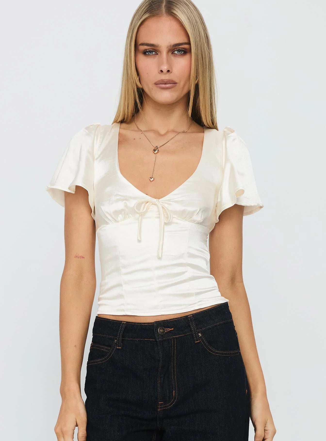 Lumière Cream V-Neck Blouse