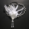 Rhinestone Feather Headpiece – Festive Glam Accessory